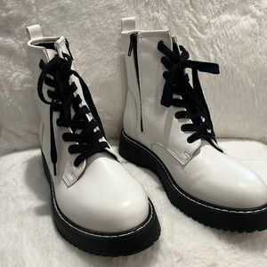 Madden girl white and black combat/lug lace up/zipper boot.